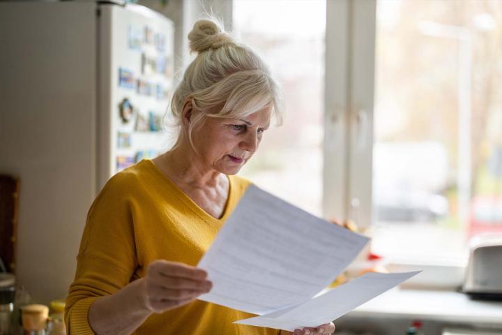 woman reading a letter