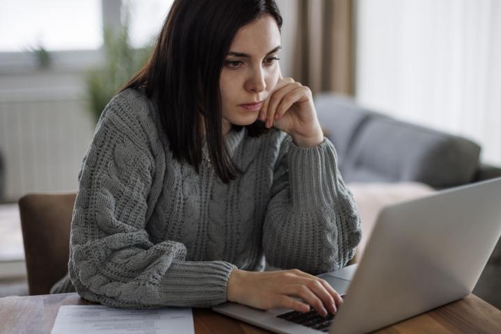 young women using laptop computer