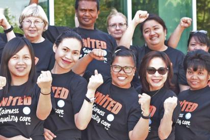 HEU members in united for fairness shirts