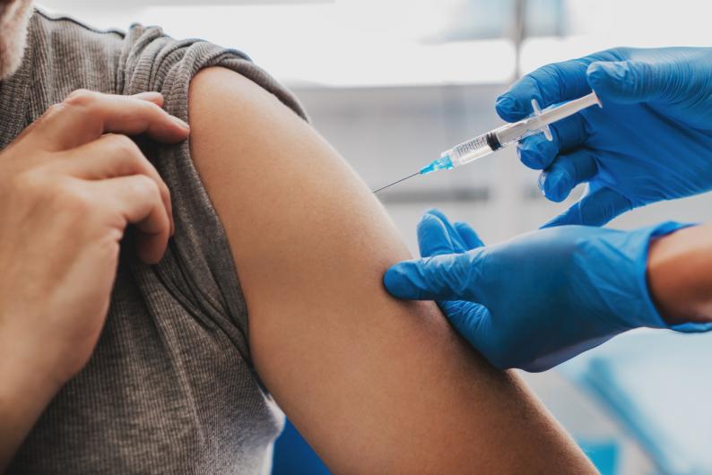 vaccine being administered in arm